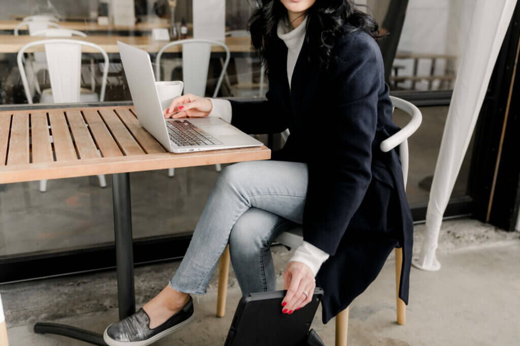 Finding The Best Wordpress Hosting For Your Website Small-Business-Owener-Working-At-Cafe