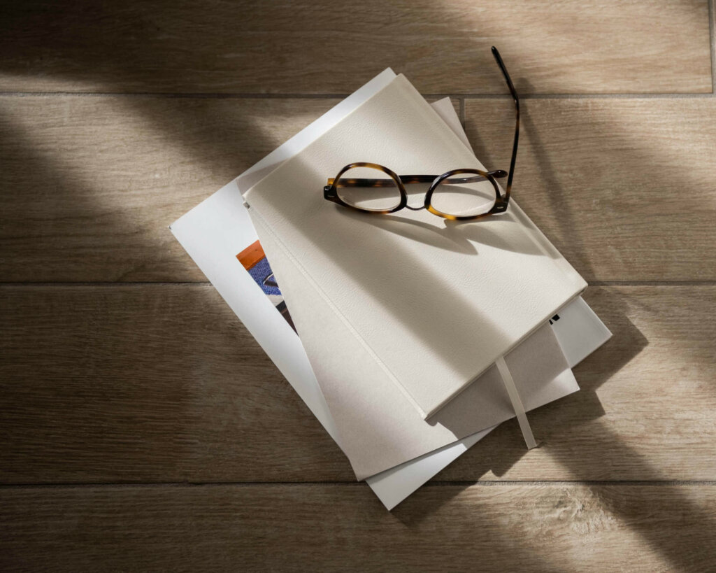 Desk With Wordpress Website Checklist And Glasses