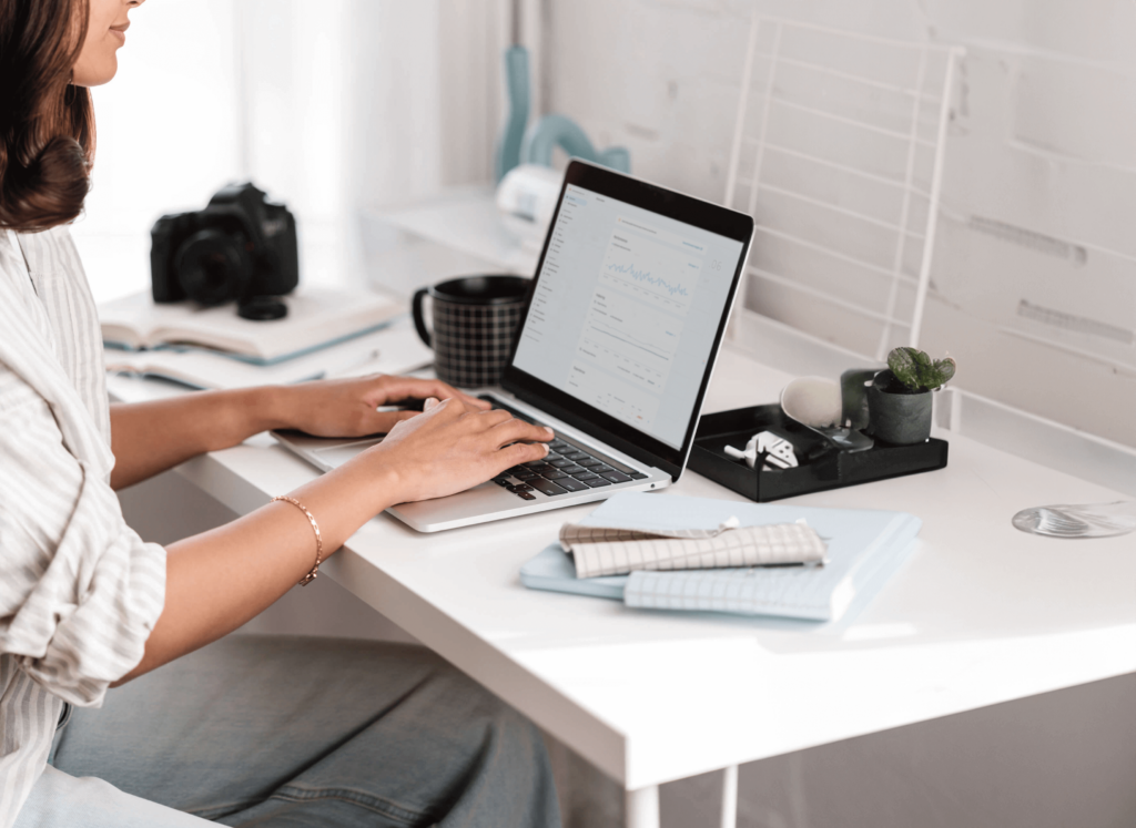 Business Owner At Desk Looking At Seo Growth