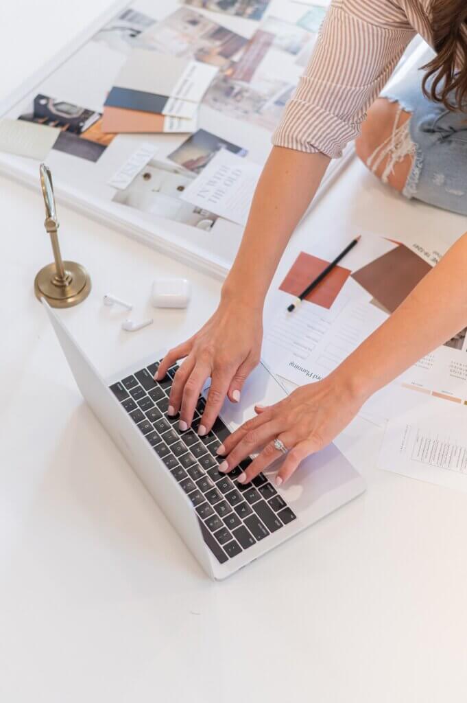 Southern Creative Owner, Stephanie O'Keefe Typing On Computer Adding A Contact Form In Wordpress