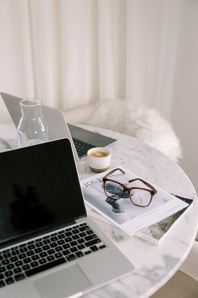 Image Of Laptop At Home Office With Glasses