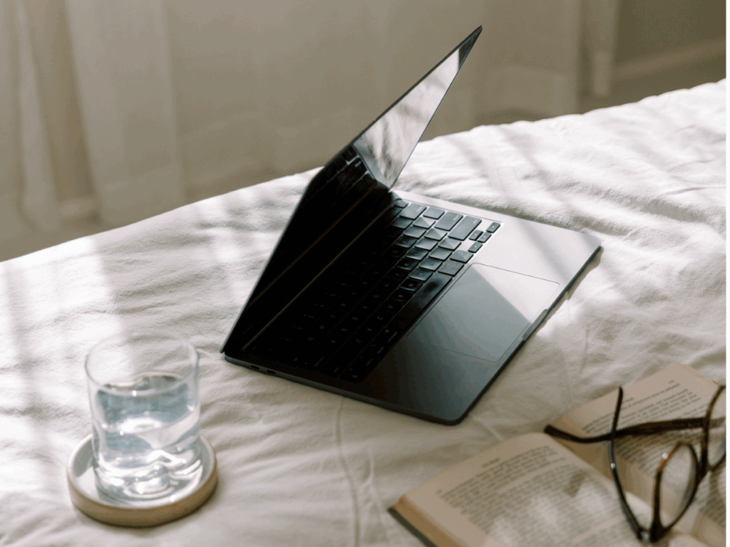 Laptop At Home On Bed While Working On Website Crawling And Indexing