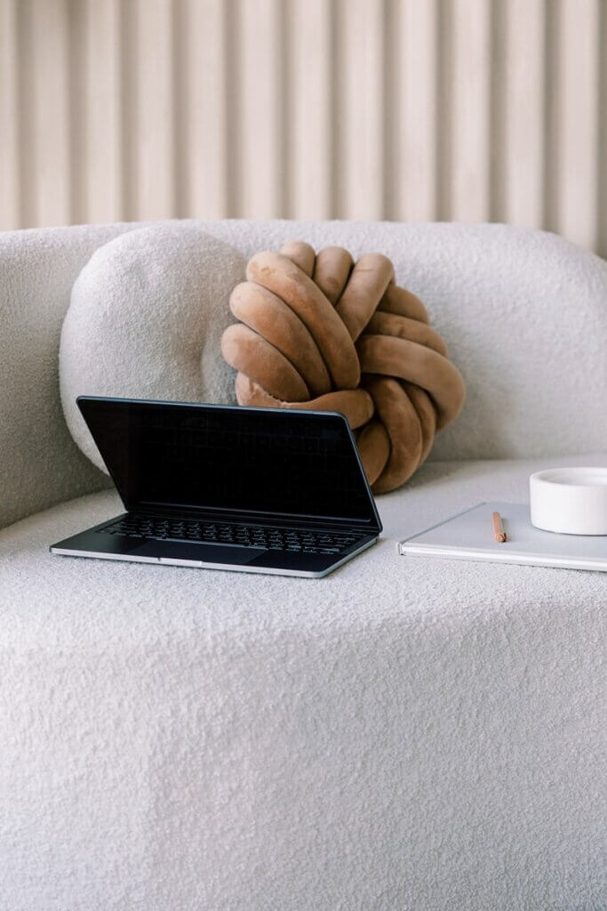 Laptop On White Couch