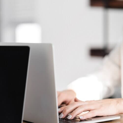 business owner typing on computer