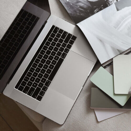 Laptop With Color Samples In Front Of It