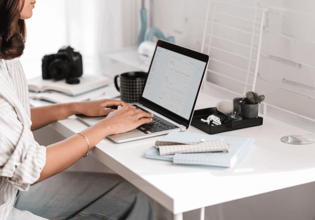 business owner at desk looking at seo growth