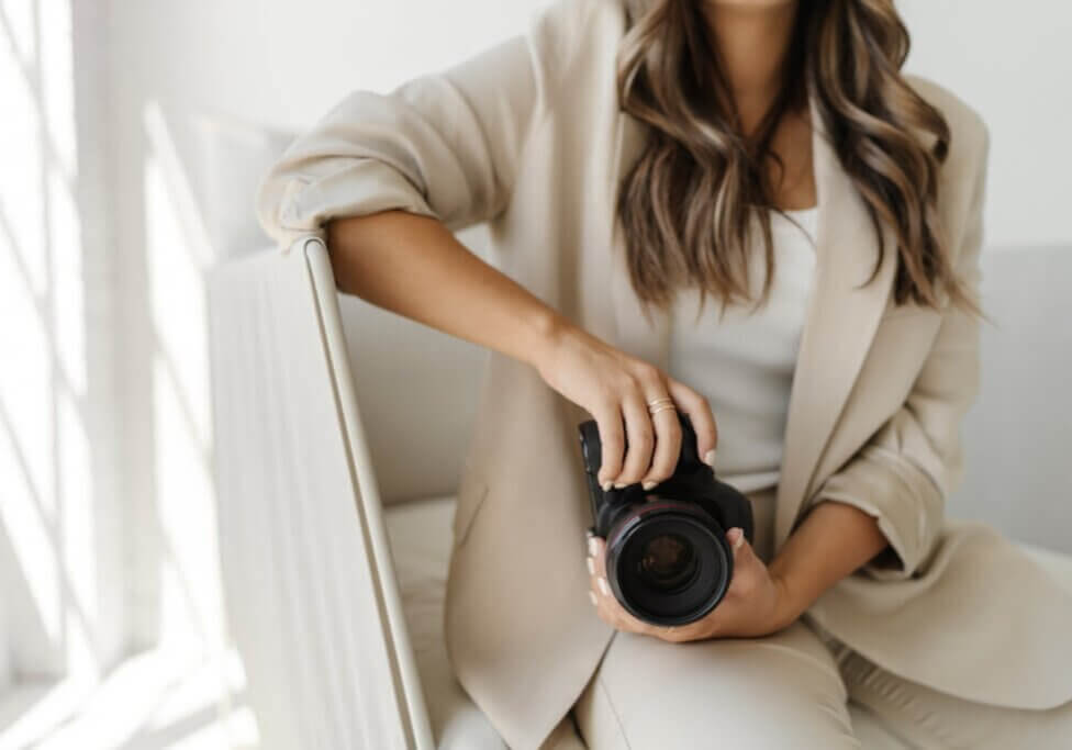 photographer holding a camera during brand shoot