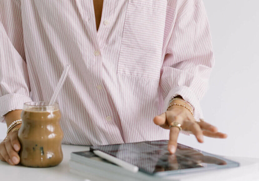 business owner learning how to post a blog in wordpress on ipad.