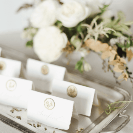 event planner display of namecards and flowers