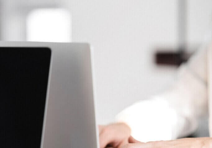 business owner typing on computer