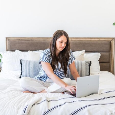 SEO strategist typing on computer working on SEO wins on website