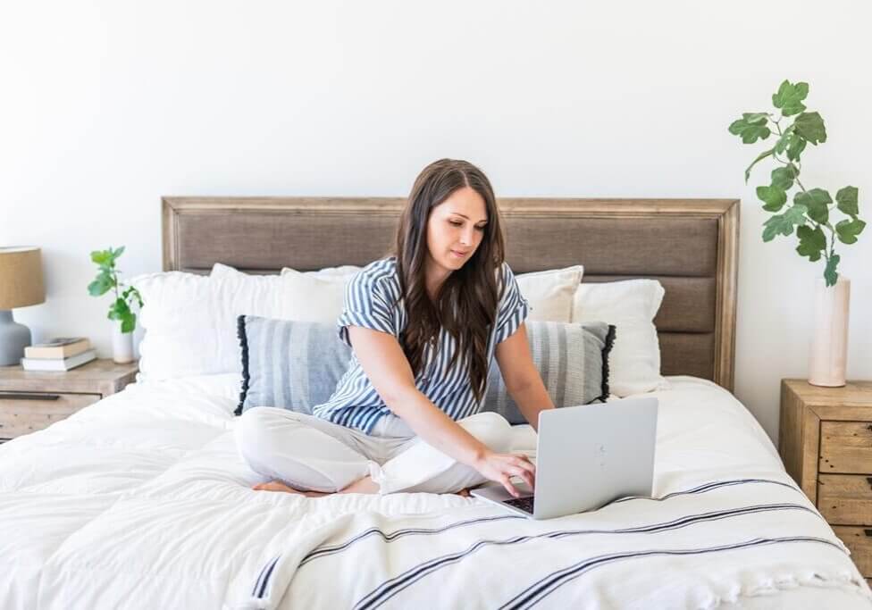 SEO strategist typing on computer working on SEO wins on website