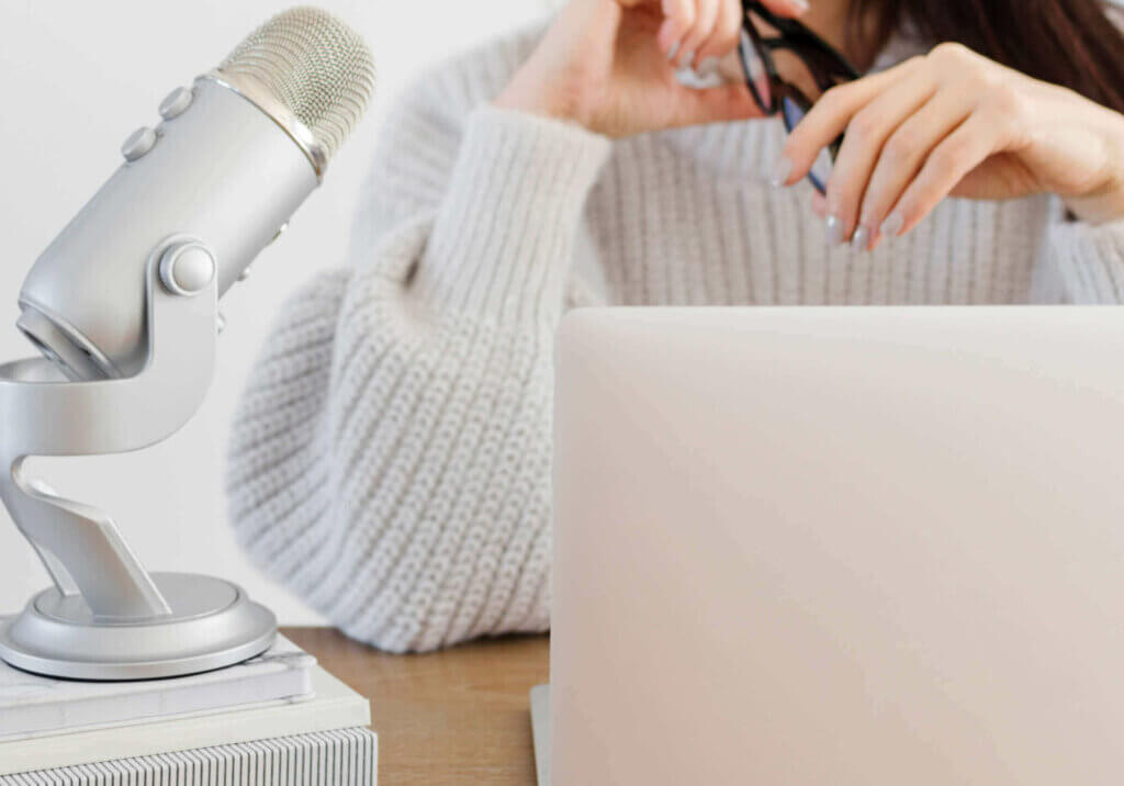 female entrepreneur web designer setting up google my business profile wearing a tan sweater