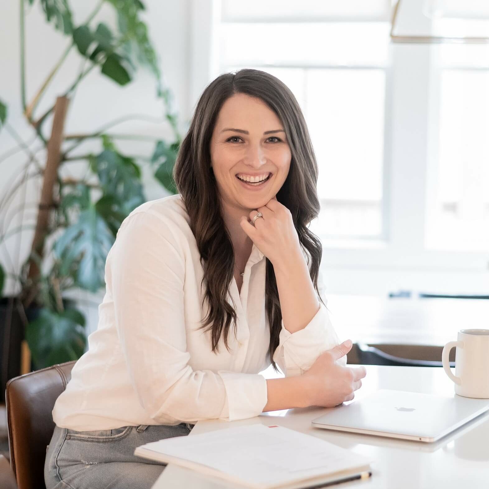 Stephanie-Okeefe-Southern-Creative-Owner Seo Strategist And Website Designer, Stephanie Okeefe Sitting At Home Office In Raleigh Kitchen.