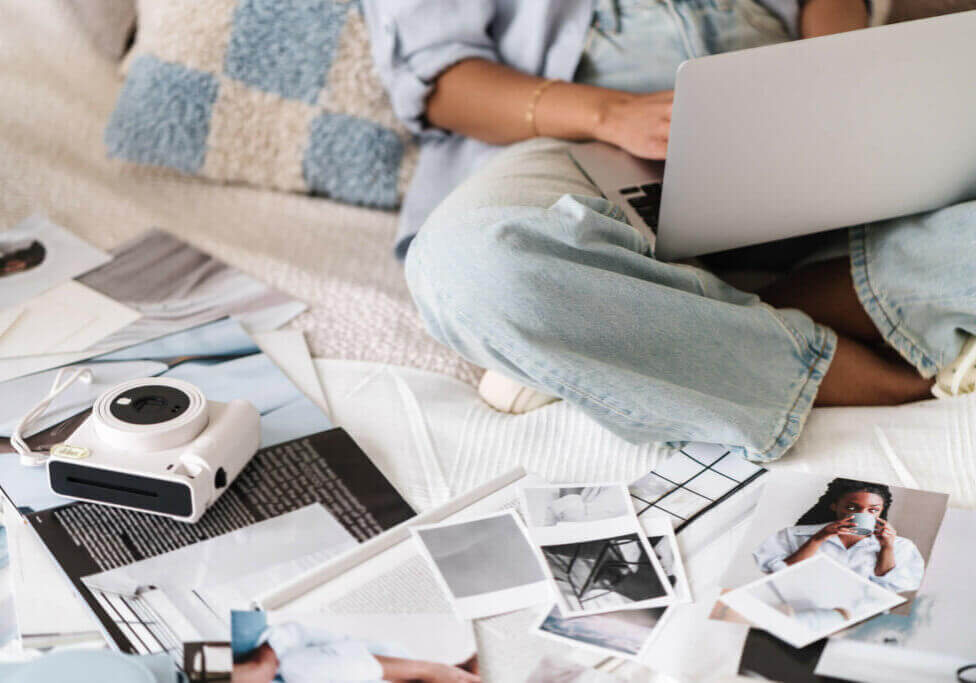 Business owner working at home on laptop.