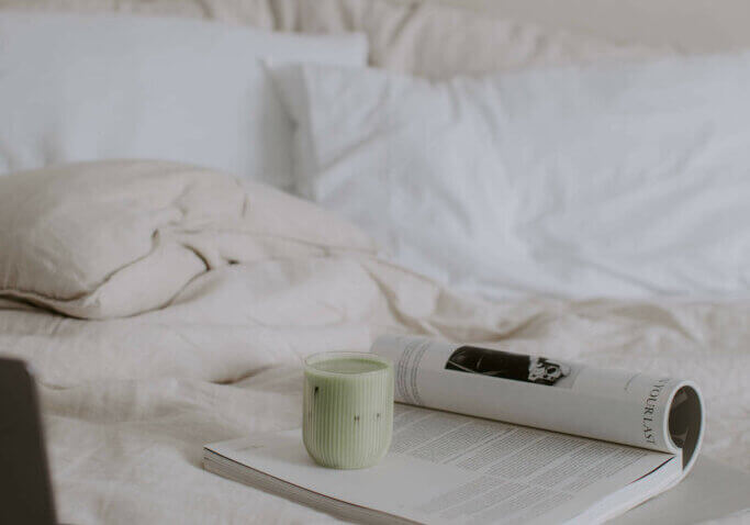 laptop on bed in home office